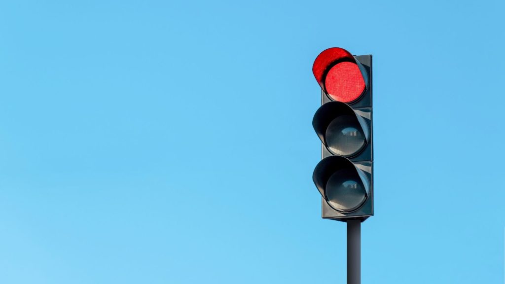 100 mph Through a Red Light in Greeley: Who Is Liable?